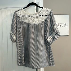 Flowy size small blouse from Loft. Pretty lace details.